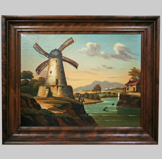 Landscape View of a Windmill Beside a Waterway