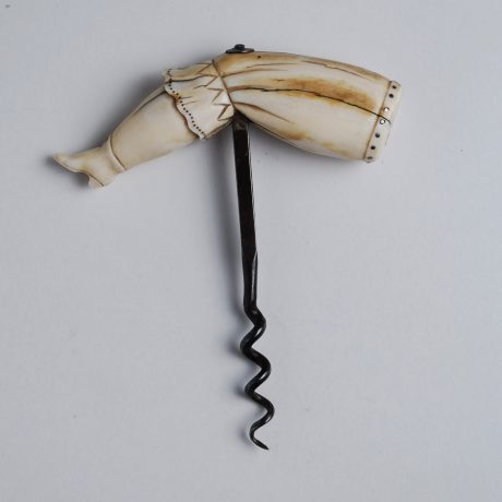 Whale Tooth corkscrew elegantly carved into a Lady's Leg wearing a Bloomer and a