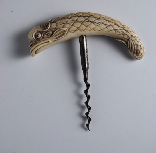 Whale Tooth corkscrew carved into the finest example of a Dolphin