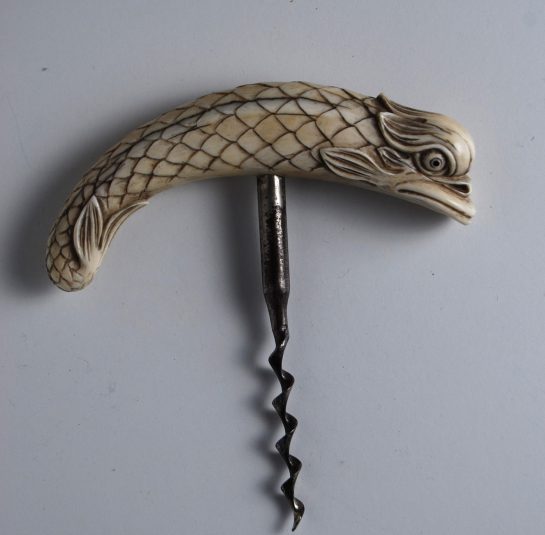 Whale Tooth corkscrew carved into the finest example of a Dolphin