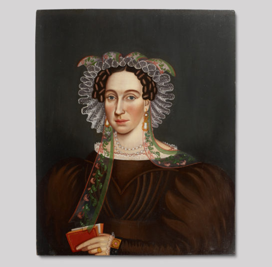 Portrait of a Woman Wearing a Lace Bonnet with a Ribbon, Holding a Book