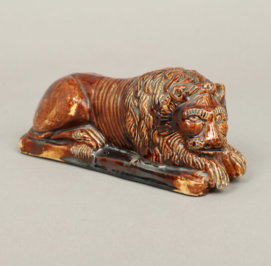 Rare Rockingham Recumbent Lion