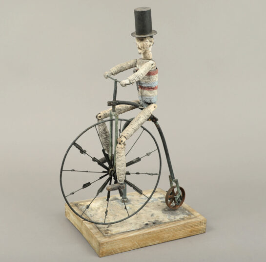 Uncle Sam on a High-Wheel Bicycle Whirligig