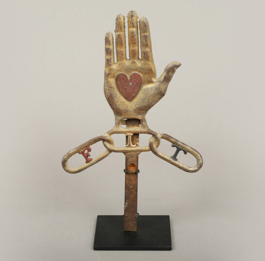 Cast Iron Heart in Hand with Chain-Links
