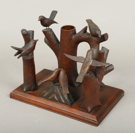 Carved Tableau of Birds Perched on Stumps